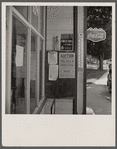 Signs outside general store. Lincoln, Vermont.