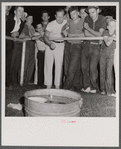 Pitching pennies. Band concert. Lincoln, Vermont.