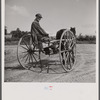 Old farmhand in his homemade buggy. Lincoln, Vermont.