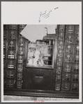 Proprietor in general store in his post office section. Lincoln, Vermont.