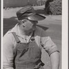 Fisherman wearing characteristic fisherman's hat. Provincetown, Massachusetts.