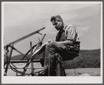 Farmer on harvester. Near Middletown, Maryland.