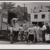 Distribution of surplus commodities near the railroad station. Huntingdon, Pennsylvania.