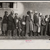 Lined up and waiting for a meal in the camp for Negro flood refugees at Forrest City, Arkansas.