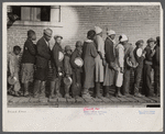 Lined up and waiting for a meal in the camp for Negro flood refugees at Forrest City, Arkansas.