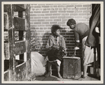 Awaiting registration in the camp for Negro flood refugees at Forrest City, Arkansas.