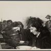 Woman at mealtime in the camp for white flood refugees, Forrest City, Arkansas.