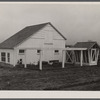 Barn, corn crib, and chickens belonging to Mr. Hardin, a Resettlement Administrator homesteader on the Arthurdale project. Reedsville, West Virginia.