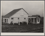 Barn, corn crib, and chickens belonging to Mr. Hardin, a Resettlement Administrator homesteader on the Arthurdale project. Reedsville, West Virginia.