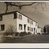 Completed two-family cinder block house. Greenbelt, Maryland.