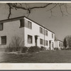 Completed two-family cinder block house. Greenbelt, Maryland.