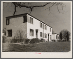 Completed two-family cinder block house. Greenbelt, Maryland.
