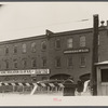 Sign showing some of the present uses of products of Amoskeag mills. Manchester, New Hampshire.