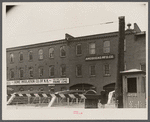 Sign showing some of the present uses of products of Amoskeag mills. Manchester, New Hampshire.