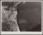Fishing in Hooksett River, New Hampshire.