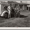 Good Humor man comes to trailer camp on Saturday afternoon. These children are sons of torpedo plant workers in Alexandria, Virginia.