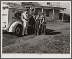 Good Humor man comes to trailer camp on Saturday afternoon. These children are sons of torpedo plant workers in Alexandria, Virginia.
