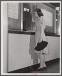 Violet Chandler, laboratory technician, buying War Stamps, Washington, D.C.