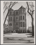 Gasoline station converted from private dwelling. Example of "blight." Washington, D.C.