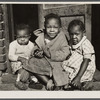 Negro children in doorway of alley home. Logan Alley, Northwest Washington, D.C.