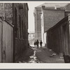 Alley near L Street, N.W. Blake School in background. Washington, D.C.