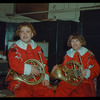 French horn players Mario Ricci and Tullio Tutrinoli in costume for Don Giovanni at the Metropolitan Opera