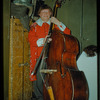 Double bass player John Scalzilli in costume for Don Giovanni at the Metropolitan Opera