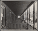 Back porches of a series of identical houses. Bound Brook, New Jersey.