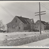 Shabby brick houses typical of Franklin Township near Bound Brook, New Jersey.