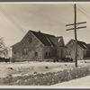 Shabby brick houses typical of Franklin Township near Bound Brook, New Jersey.