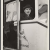 Administrator Tugwell at window of blimp before taking off.