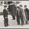 Administrator Tugwell with captain of ship, two of his aides, Mr. Richards and Mr. McManns, and a representative of the Scripps-Howard press, Mr. Brown.