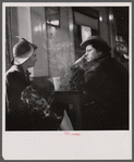 Washington, D.C. Women gossiping in a drugstore over cokes.