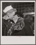 Washington, D.C. Sailor kissing his mother goodbye at the Greyhound bus depot.