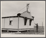 Placing house panels.  South East Missouri Farms.