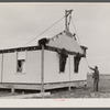Placing house panels.  South East Missouri Farms.