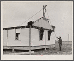 Placing house panels.  South East Missouri Farms.