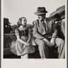 New York, New York. Dr. Winn [or Wynn], a Czech-American, telling Janet a tall story in Central Park.