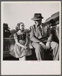 New York, New York. Dr. Winn [or Wynn], a Czech-American, telling Janet a tall story in Central Park.