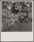 Washington, D.C. Salvage drive, Victory Program. Aluminum kitchen utensils and scrap paper stored in warehouse of District wholesale junk company.
