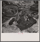 Washington, D.C. Salvage drive, Victory Program. Rubber scrap stored in warehouse of District wholesale junk company.