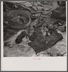 Washington, D.C. Salvage drive, Victory Program. Rubber scrap stored in warehouse of District wholesale junk company.