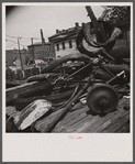 Washington, D.C. Scrap salvage campaign, Victory Program. Bicycle, tires and shovel in yard of retail junk dealer.