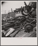 Washington, D.C. Scrap salvage campaign, Victory Program. Bicycle, tires and shovel in yard of retail junk dealer.