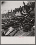 Washington, D.C. Scrap salvage campaign, Victory Program. Bicycle, tires and shovel in yard of retail junk dealer.
