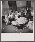 Washington, D.C. Scrap salvage campaign, Victory Program. Schoolchildren bring their scrap paper from their classrooms into the cellar, where it is picked up by paper company truck.
