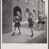 Washington, D.C. Scrap salvage campaign, Victory Program. Children bringing their weekly contribution of scrap paper to school.