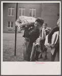 Washington, D.C. Scrap salvage campaign, Victory Program. Children bringing their weekly contribution of scrap paper to school.