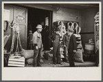 Scene in front of harness and hardware store, Newport, Tennessee.