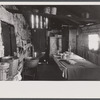 Kitchen and washroom of two room mountain shack, Route U.S. 11, a few miles east of Marshall, North Carolina.
